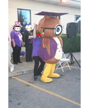 Round Brown and White Owl Mascot Costume with a Purple Graduation Cap